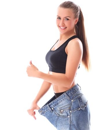 woman-wearing-old-jeans-after-weight-loss-min